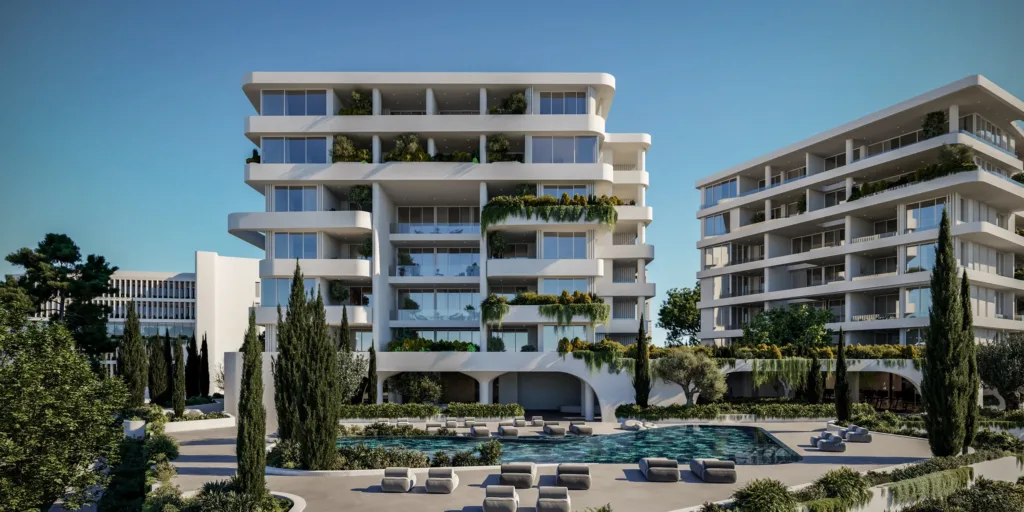 Toà B của Elysia Blu và sân hồ bơi giữa hàng cây bách