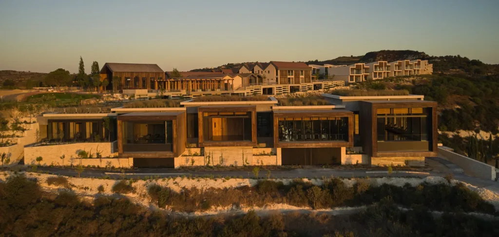 The spa building on the hillside at golden hour