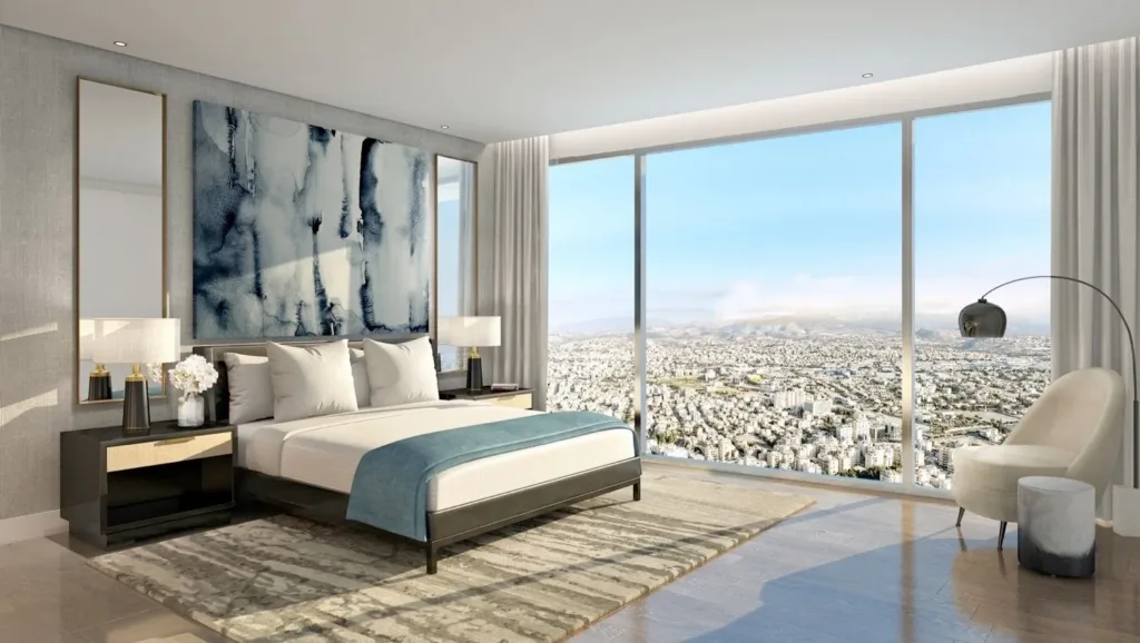 Apartment bedroom with floor-to-ceiling glazing over the city