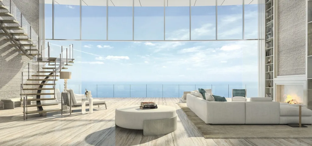 A high-ceilinged living room with full-height glazing, a white metal spiral staircase and a curved cream sofa.