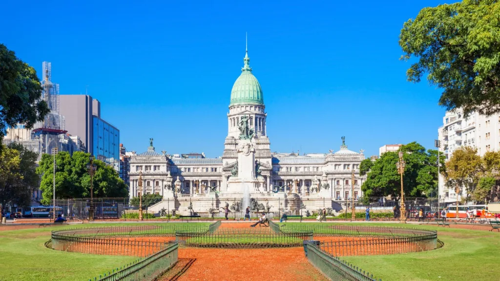 The Palace of the Argentine National Congress in Buenos Aires, with its green dome, seen across Congress Plaza