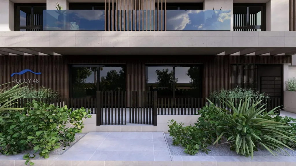 A visualisation of the TOPCY46 ground-floor entrance with planting and a TOPCY 46 sign